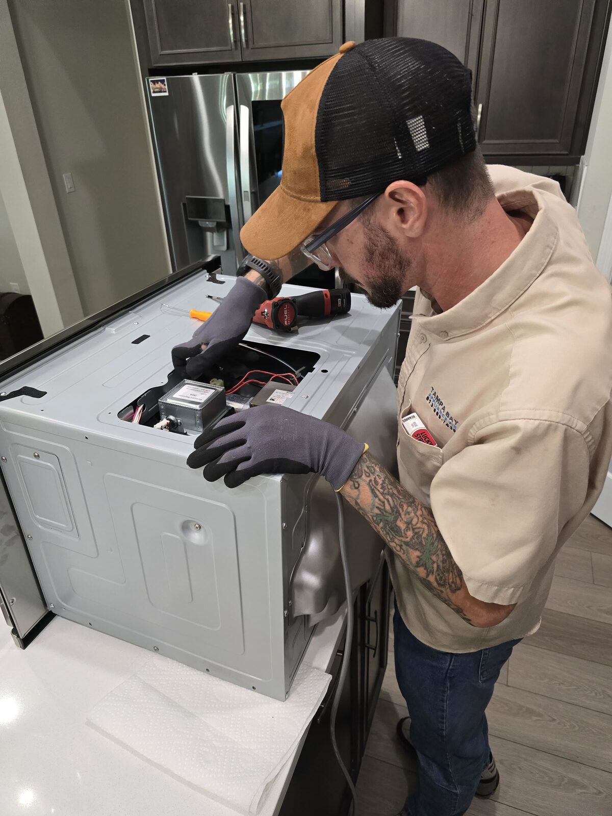 Lexington Appliance Repair technician servicing a dryer