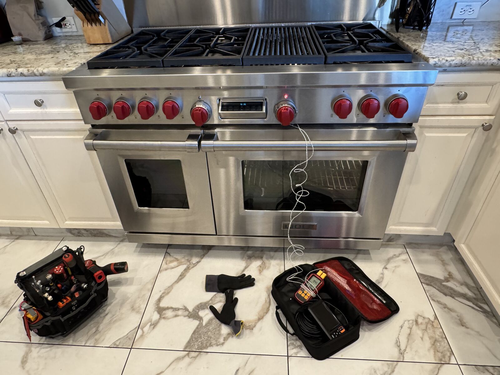 Wolf dual-fuel range undergoing igniter repair by Lexington Appliance Repair
